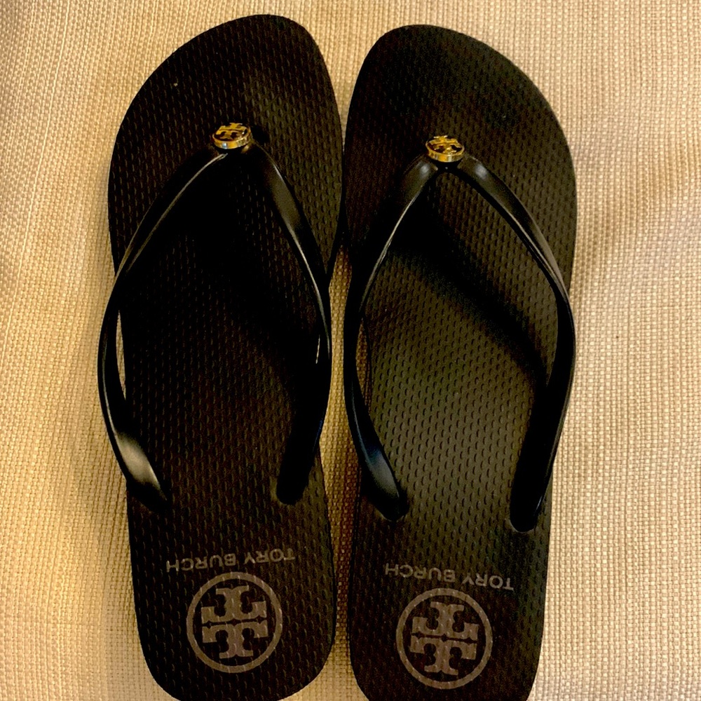 Tory Burch platform flip flops. I have only wore these two times.